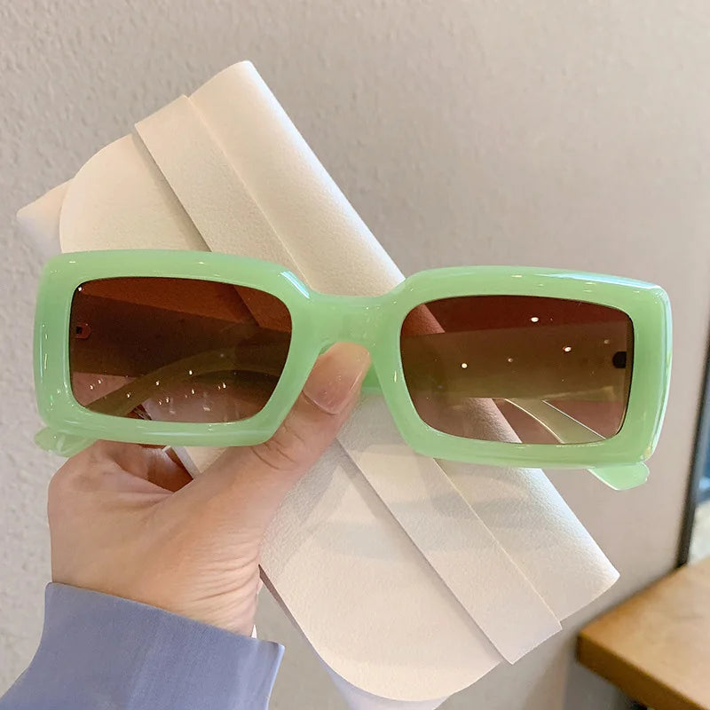 MCROONS Candy Colour sunglasses - green variant, held
